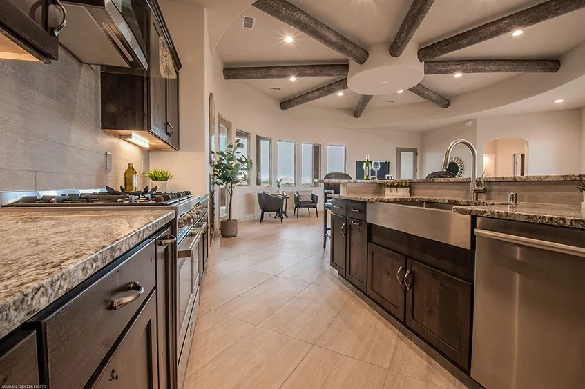 Kitchen with island and warm wood cabinetry