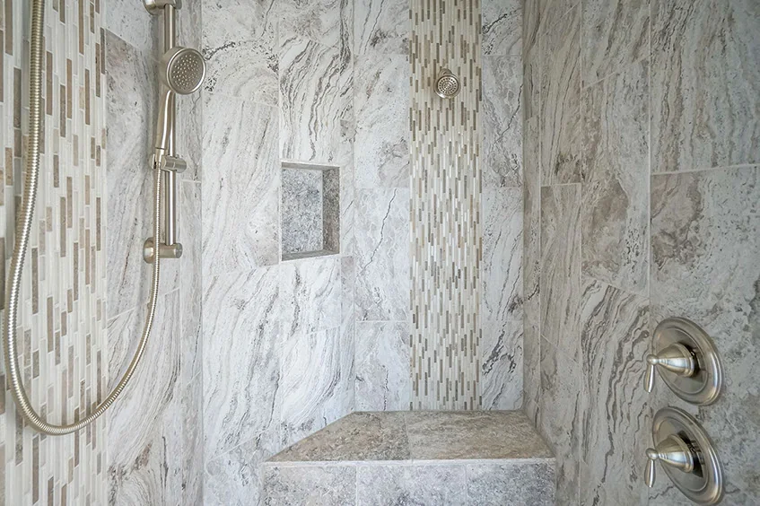 Tiled shower with a shaped opening