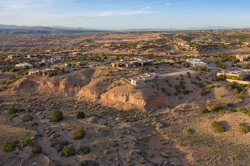 Aerial view of the home in its high-desert setting