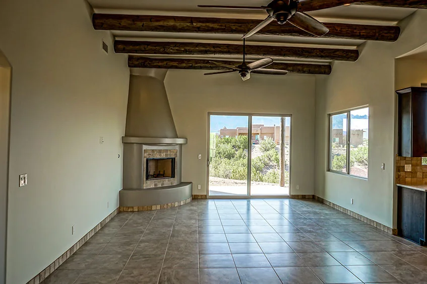 The Mesa great room looking toward the fireplace and patio
