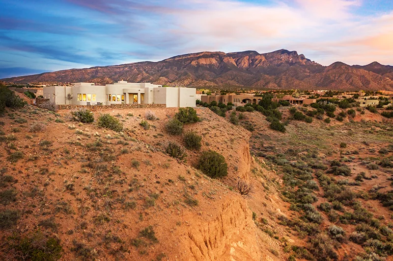 Home positioned along the high-desert hillside