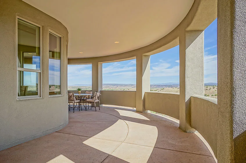 Covered porch opening to the landscape